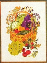 Vegetables & Herbs in a Basket / Eva Rosenstand